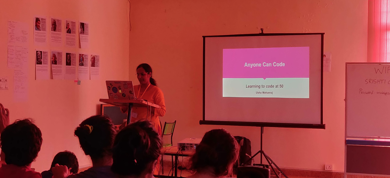 Usha Mohanraj presenting her talk “Anyone Can Code: Learning to code at 50”